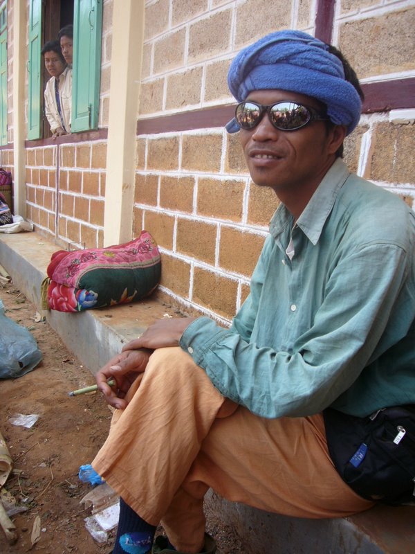 Ko-Shwe, the guide smoking his awful cigars.